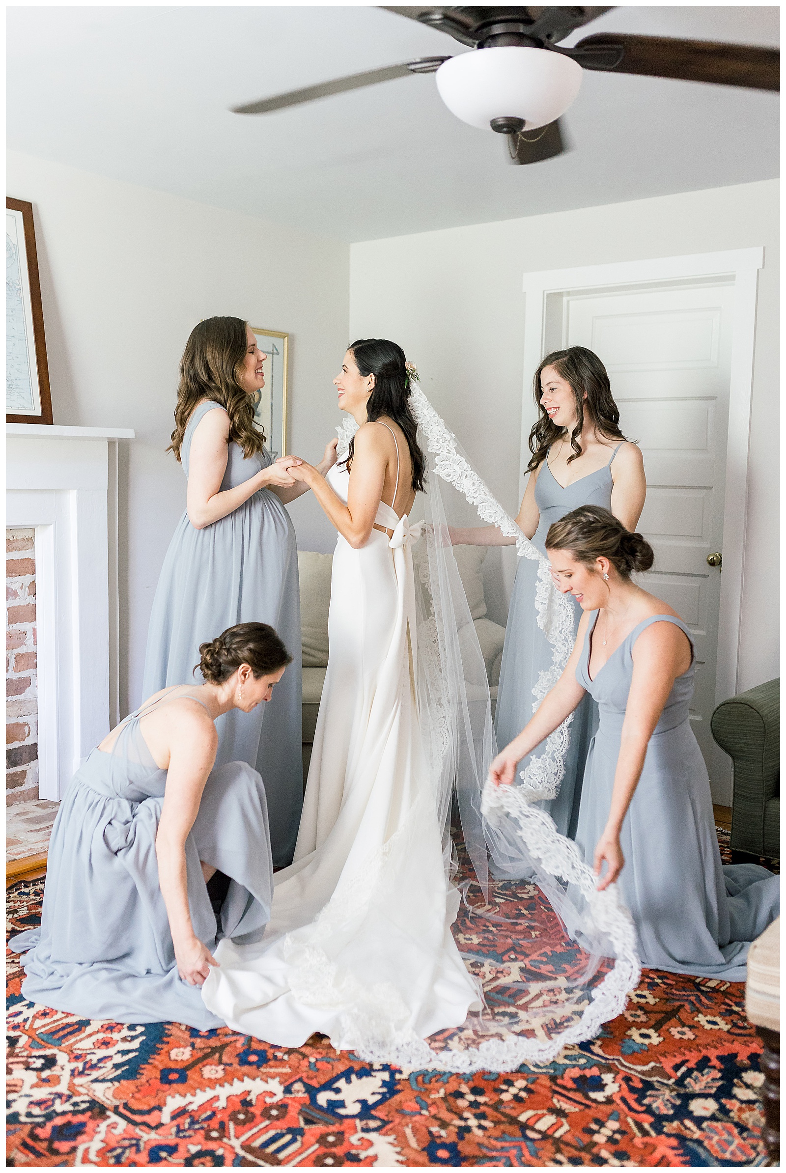 bride and bridesmaids getting ready
