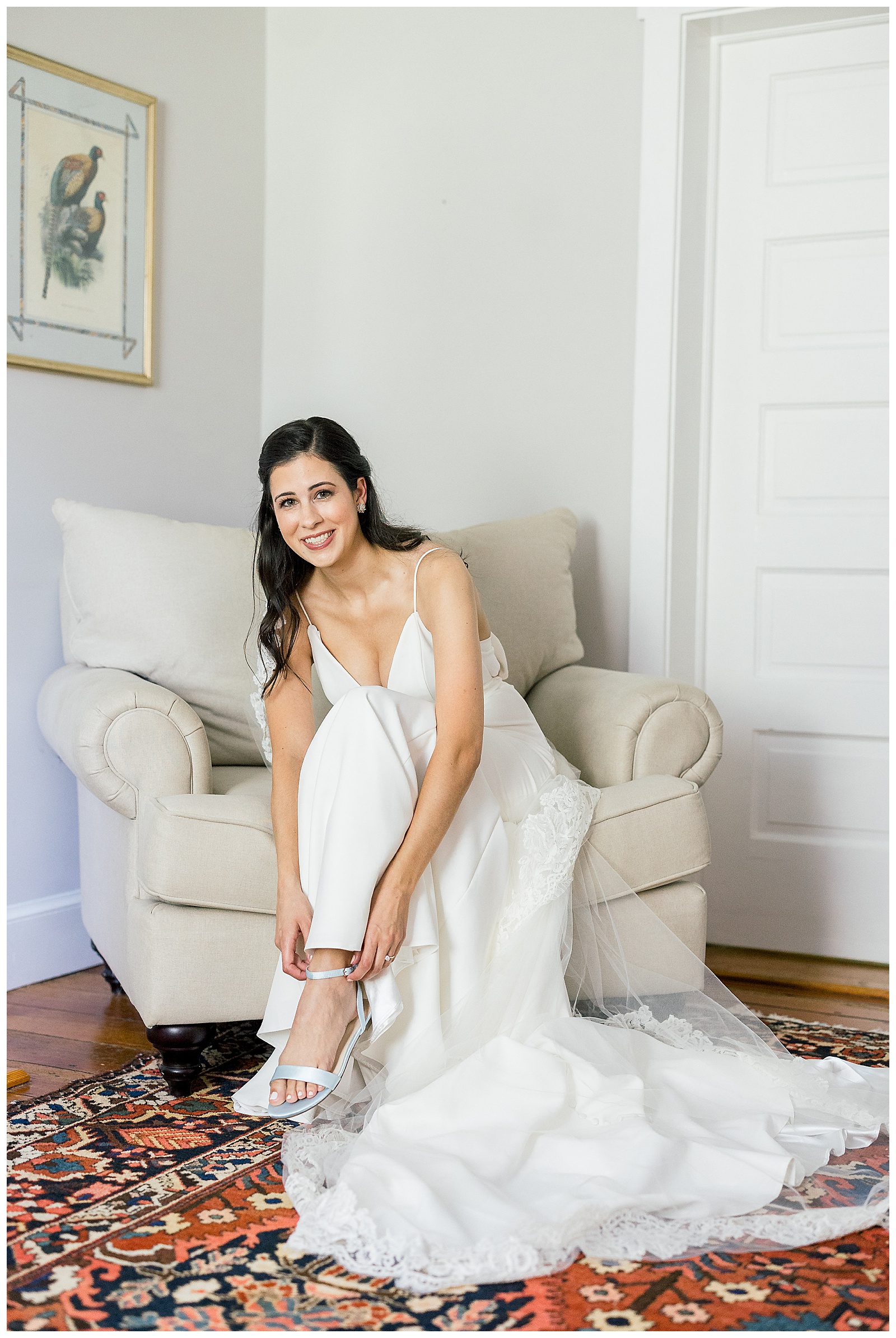 bride putting on shoes

