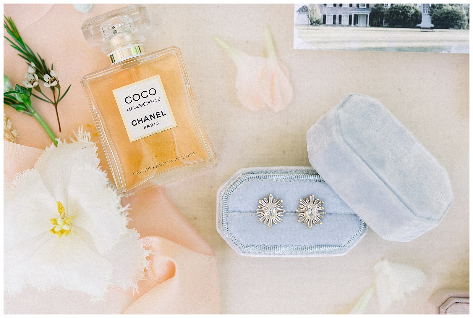 peach and blue wedding details coco Chanel perfume and earrings 