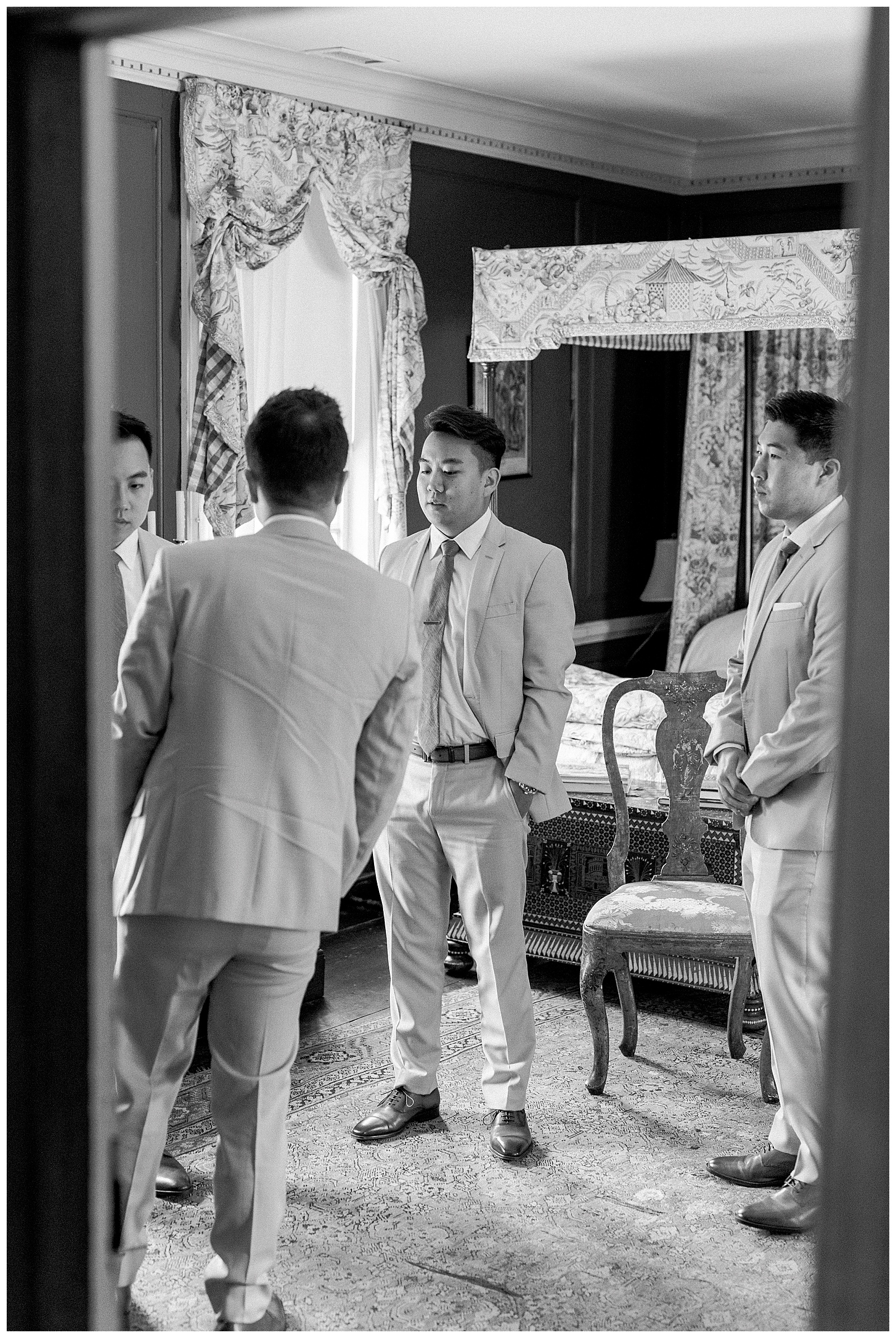 groom chatting with groomsmen
