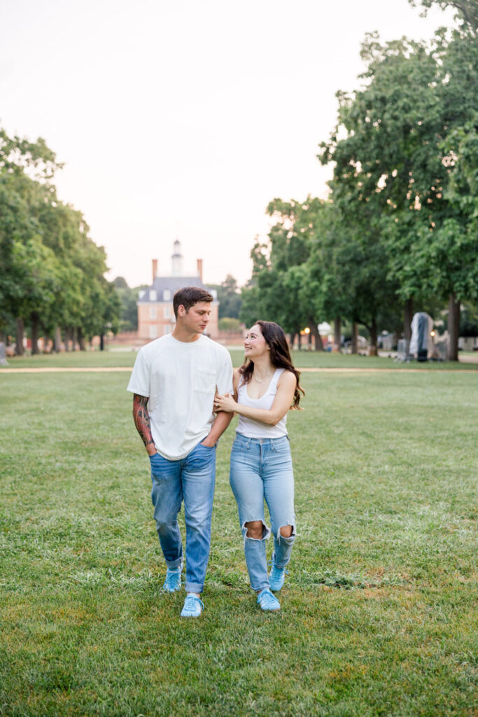 couple walking in front of Governor's Palace