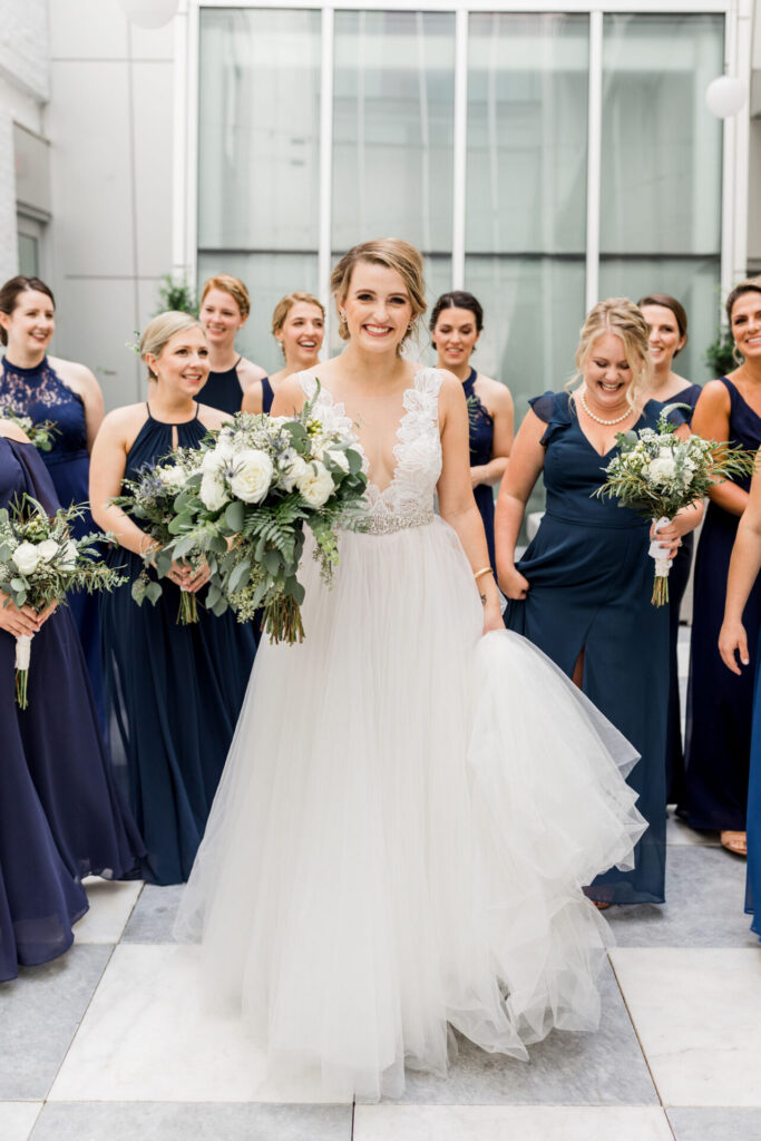 bride and bridesmaids portrait inside Quirk Hotel Richmond