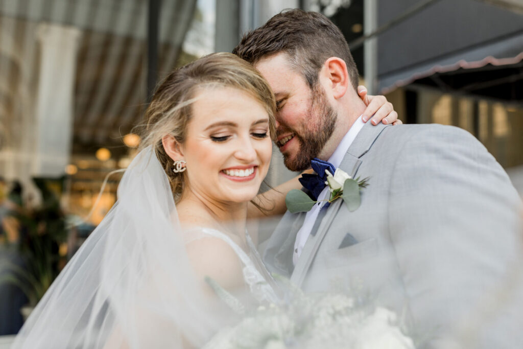 bride and groom portrait with veil at Quirk Hotel Richmond