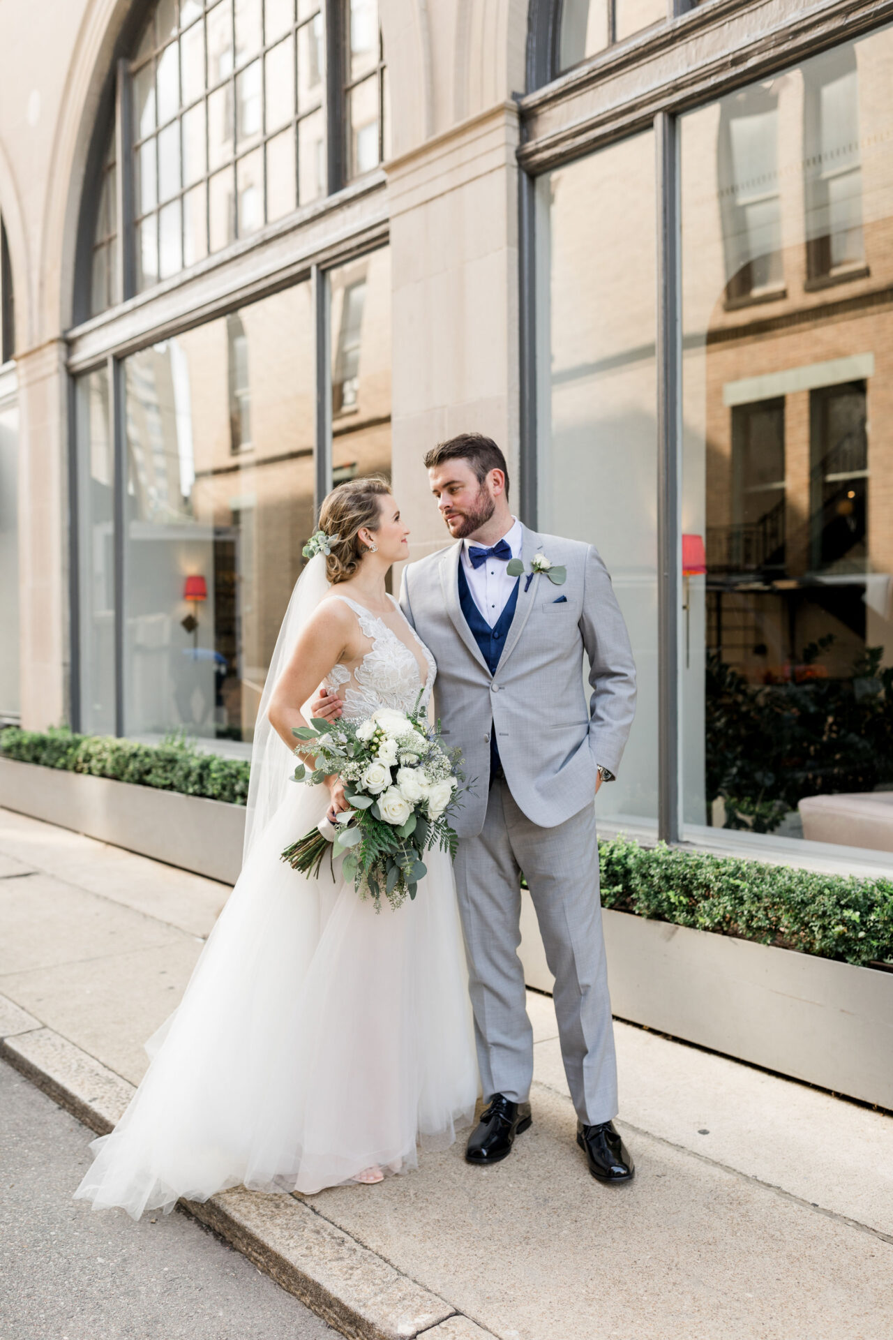 bride and groom smiling at one another at Quirk Hotel Richmond