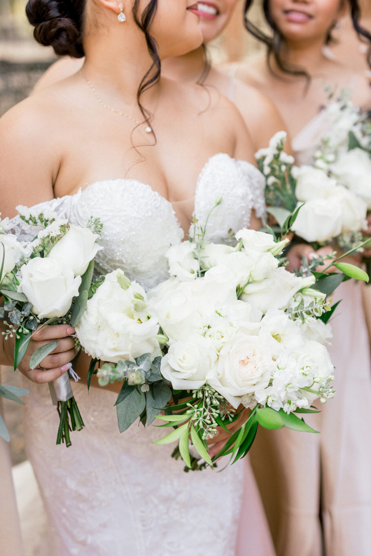 white bridal bouquet and champagne bridesmaids dresses at Founders Inn wedding Virginia Beach