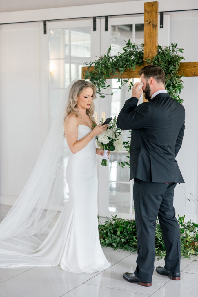 groom wipes away tears first look Gala 417 Virginia Beach