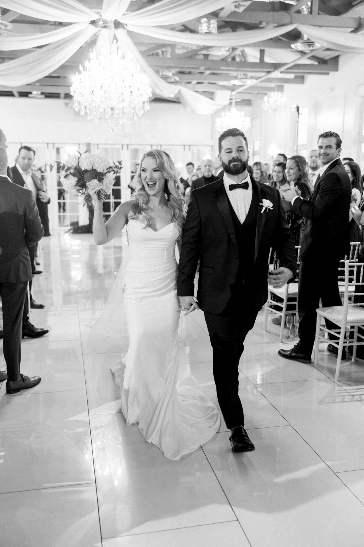 black and white photo of bride and groom exit ceremony Gala 417 wedding