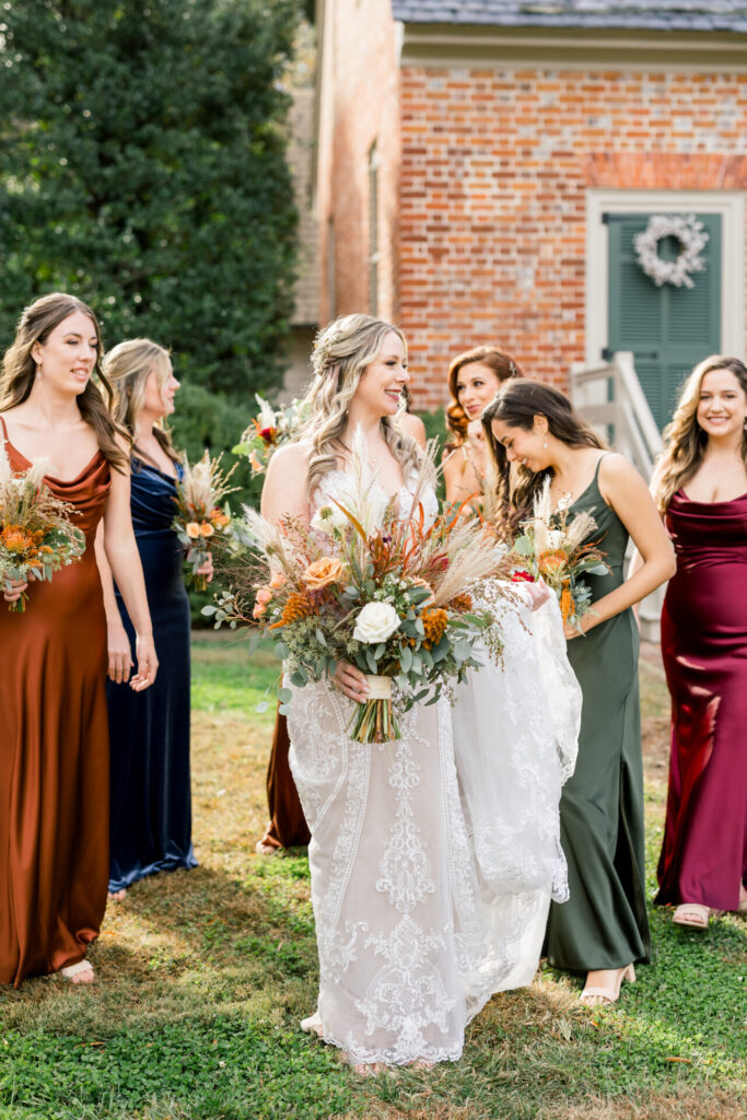 bride walking with bridesmaids to ceremony Seven Springs Richmond Va wedding