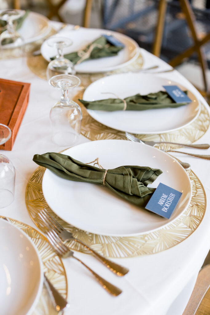 white plate and green napkin wedding reception decor Seven Springs