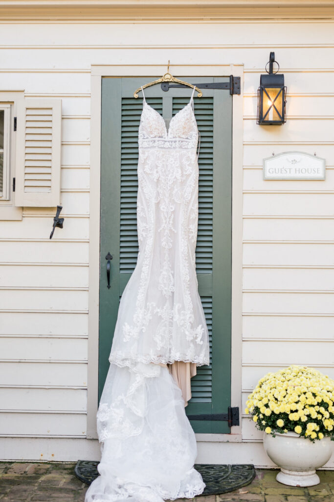 Wedding dress hanging from door 
Seven Springs Wedding Richmond Va