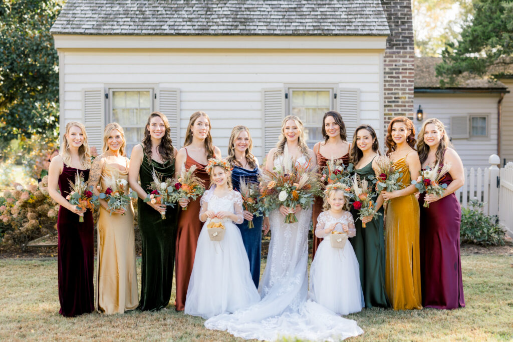 bridesmaids photo with bride outside in garden Seven Springs Richmond VA wedding