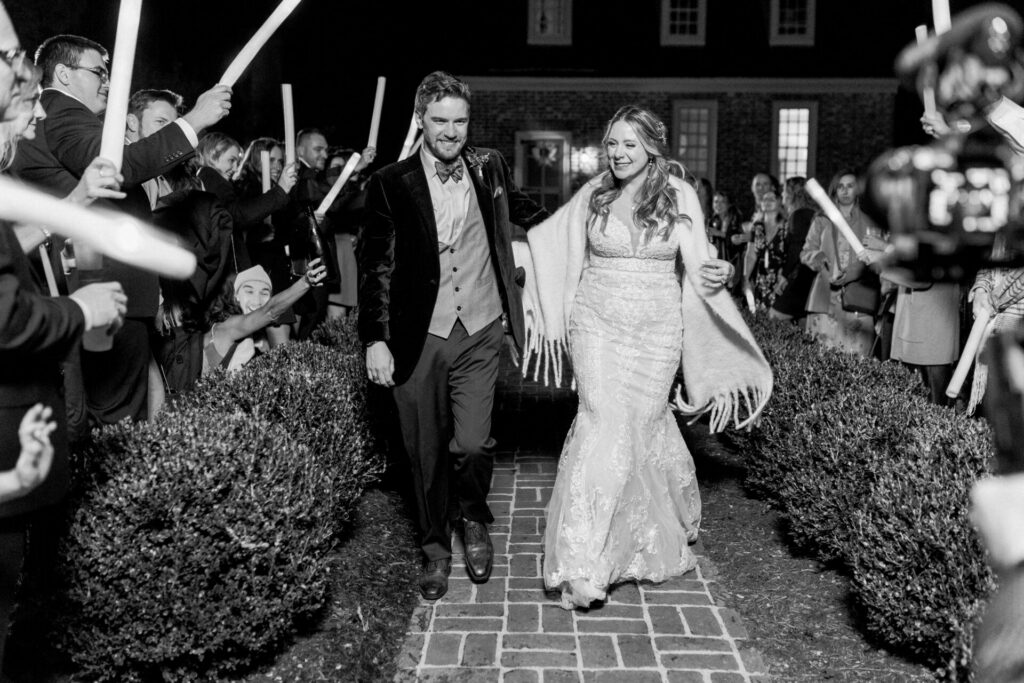 black and white photo of bride and groom wedding exit Seven Springs Richmond Va